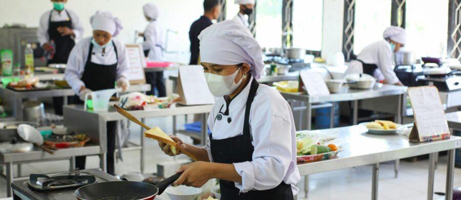 Hospitality staff preparing tables for a fine dining experience – hospitality recruitment