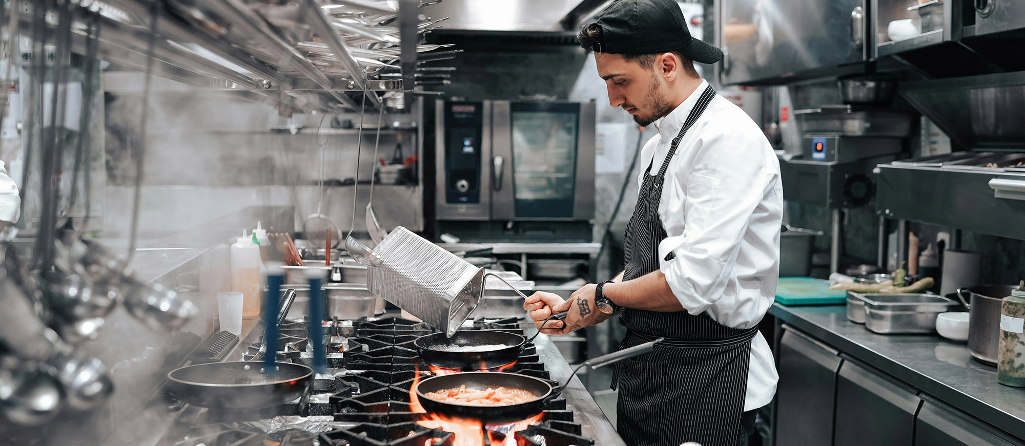 Sous chef preparing a new dish for the menu – catering employment agency