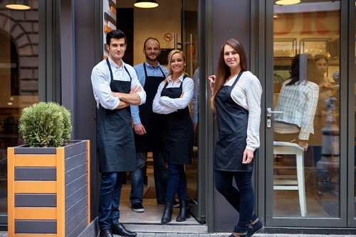 Catering team plating meals with precision – catering and hospitality employment