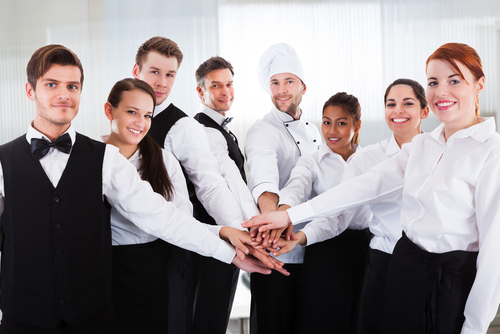 Hotel kitchen team preparing meals for room service – catering recruitment support