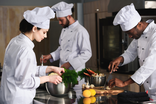 Chef tasting food before service – quality control in hospitality