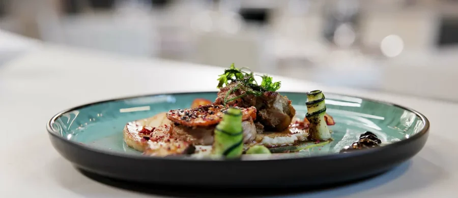 Commercial kitchen full of chefs preparing high-end meals – hospitality career opportunities