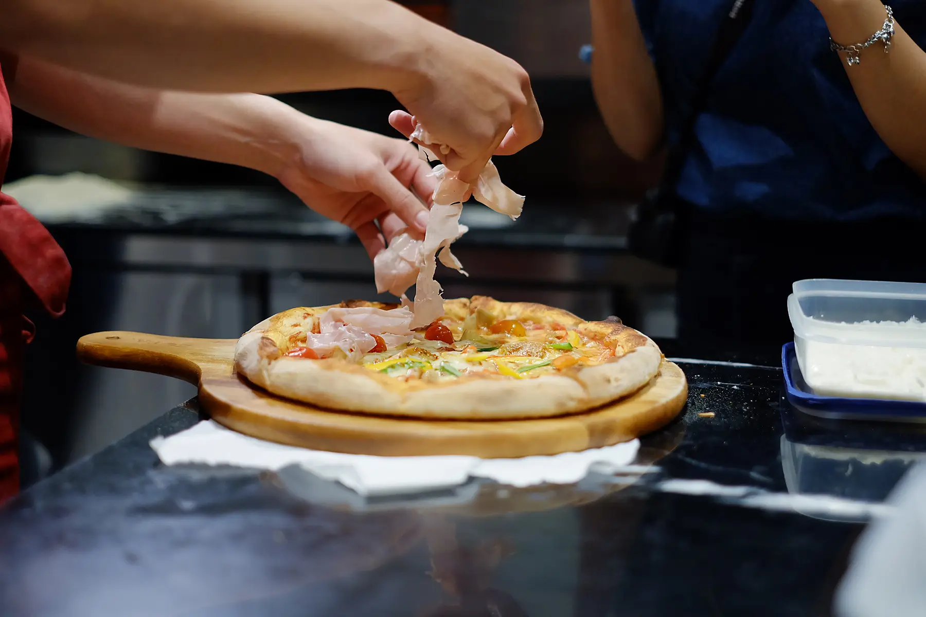Catering professionals delivering meals to event guests – hospitality career growth