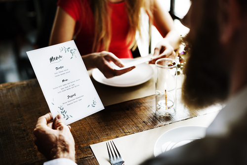 Catering staff arranging desserts for a wedding reception – hospitality job market